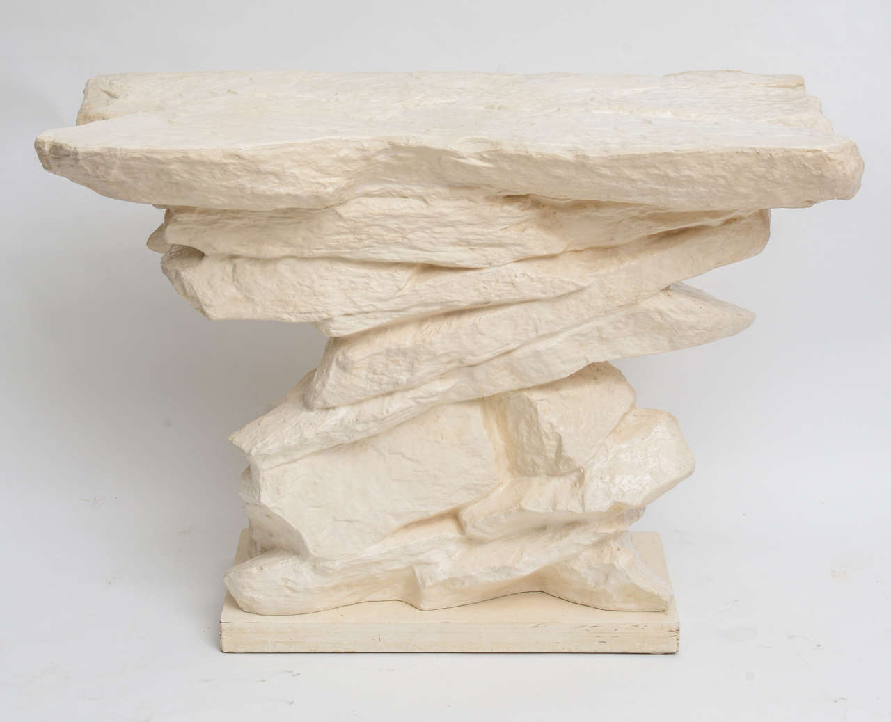 Sirmos Rock Console,great take on Serge Roches work.
Painted Plaster with wood base.