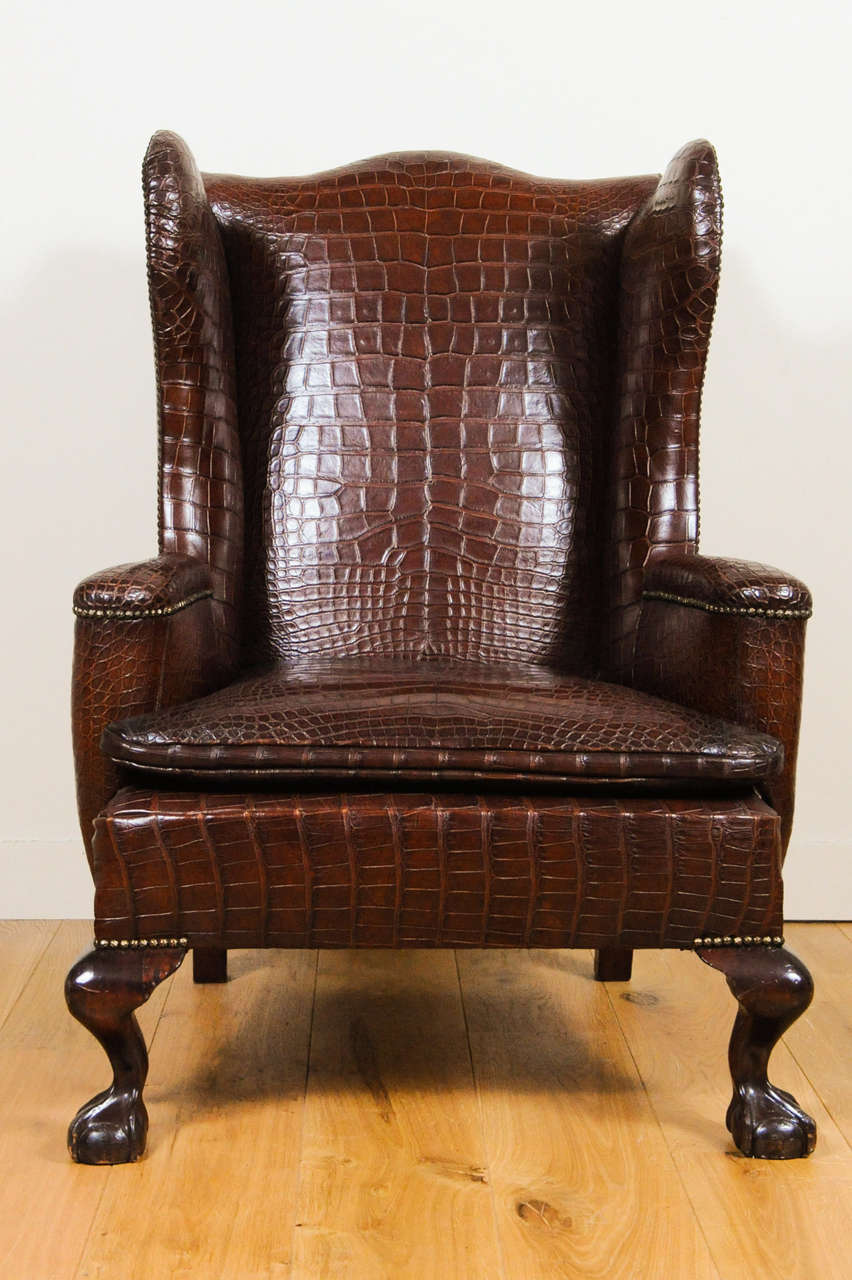 A very unusual and chic crocodile upholstered wing chair from circa 1750. This very rare and important chair is one of a kind. The upholstering of the chair is perfectly done in a symmetrical way, a true masterpiece. In perfect condition.