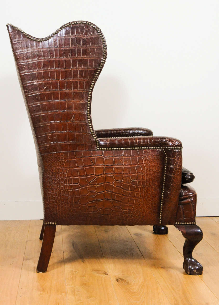 British A Very Unusual And Chic Crocodile Upholstered Wing Chair. For Sale