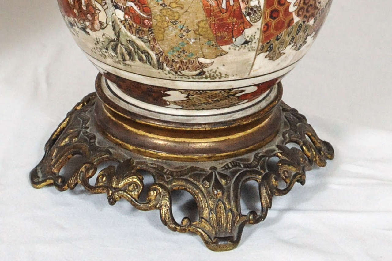 Japanese A fantastic pair of Satsuma lampstands, former oil-lamps. For Sale