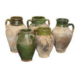 Collection de cinq (5) pots à olive anciens en terre cuite