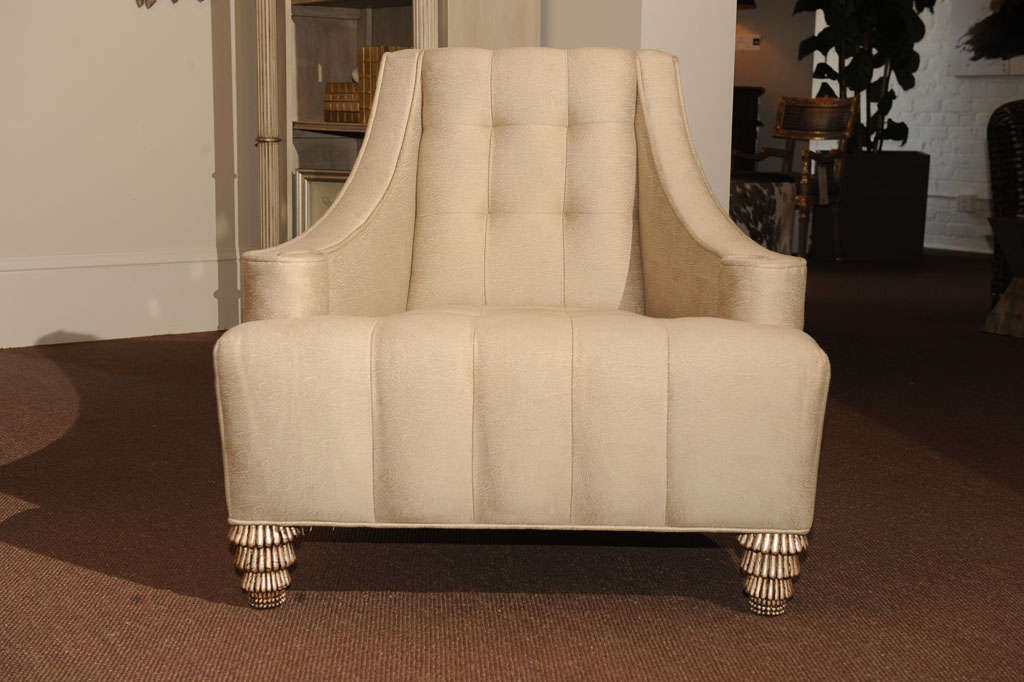 Candace Barnes Now designed graceful and elegant, 'origami' chair, the front with waterfall seat all hand tufted with sweeping inward nautilus inspired arms, channelled tufted back raised on hand-carved silver leafed. 

Egyptian reed crowned legs.