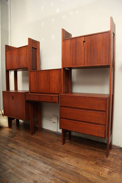 Made in Denmark. Made of Teak. Desk, cabinets and shelves require assembly