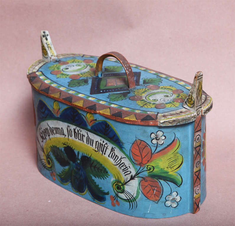 Fine 19th Century (dated 1888) Swedish pantry box, the oval lid with bentwood handle held by wood spring horns, having floral decoration and bearing the legend 