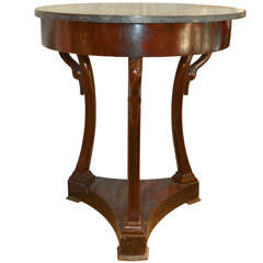 A "col de cygne" round table