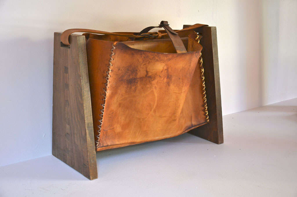 A very chic magazine holder
Wood and leather