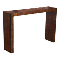 parson's table reinterpreted in antique bamboo veneer