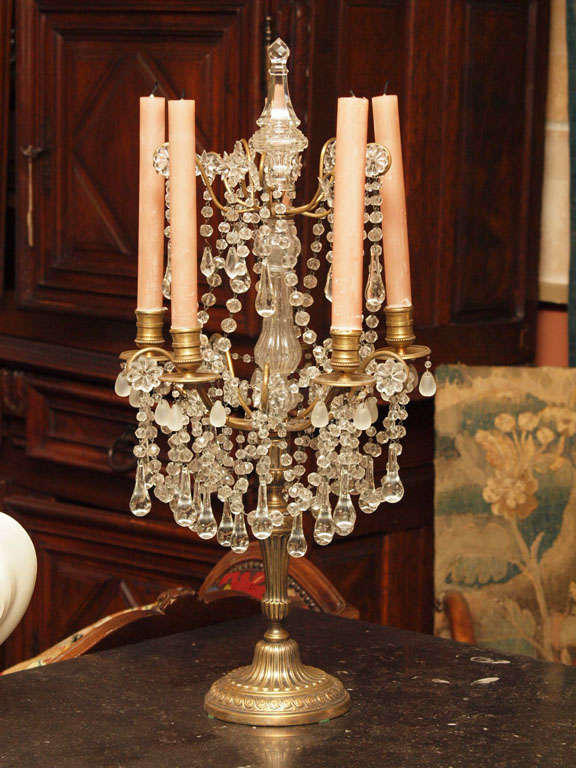Pair of French Louis XVI period five arn brass and crystal girandoles