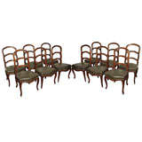 Set of Twelve "Nogaret" Style Dining Chairs