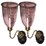 pair of dramatic looking pale amethyst glass globes on sconces