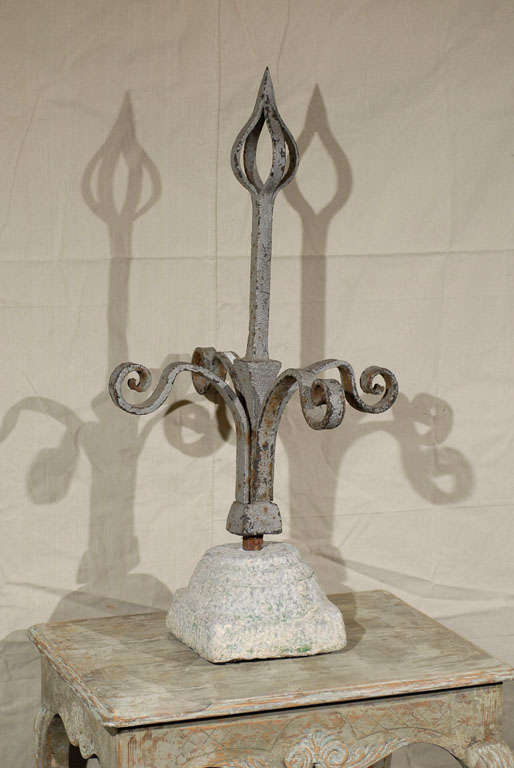 A French 19th century large size painted iron finial in granite base. The finial itself comes off its base. Wonderful look.