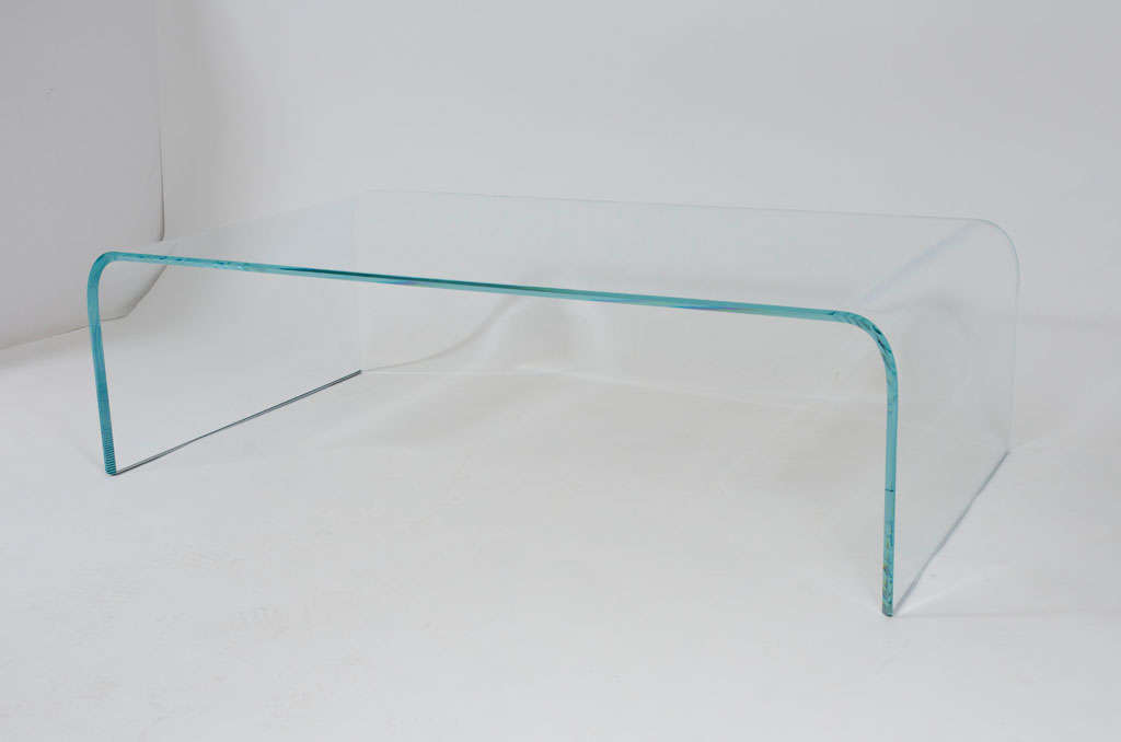 An elegant and ultra modern rectangular cocktail table in 1/2