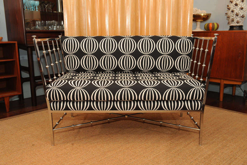 Chic chrome faux bamboo design settee newly upholstered, made by Drexel Furniture Co.
