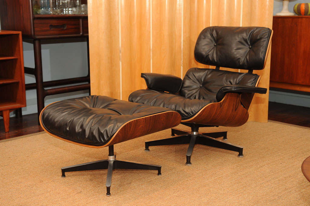 Original rosewood Charles Eames design for Herman Miller 670/671 lounge chair and ottoman. Newly upholstered in black leather, rosewood in very good vintage condition. Tagged and dated 1969.
