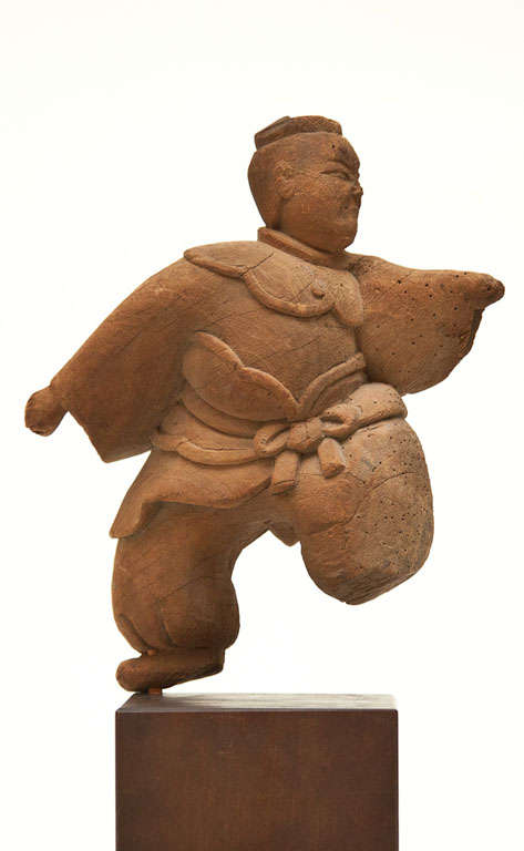 Very early Japanese wood Shinto carving of a figure in a martial arts pose, Kamakura period (1185- 1333). Comes with base (measurements include base).
