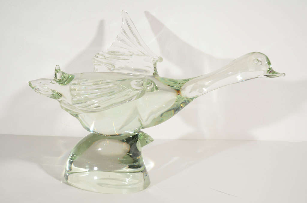 Fine hand blown Murano glass 

waterbird with stylized wave base.

Exceptional design with great form

visible from all angles. Signed by 

the artist, L Zanetti.