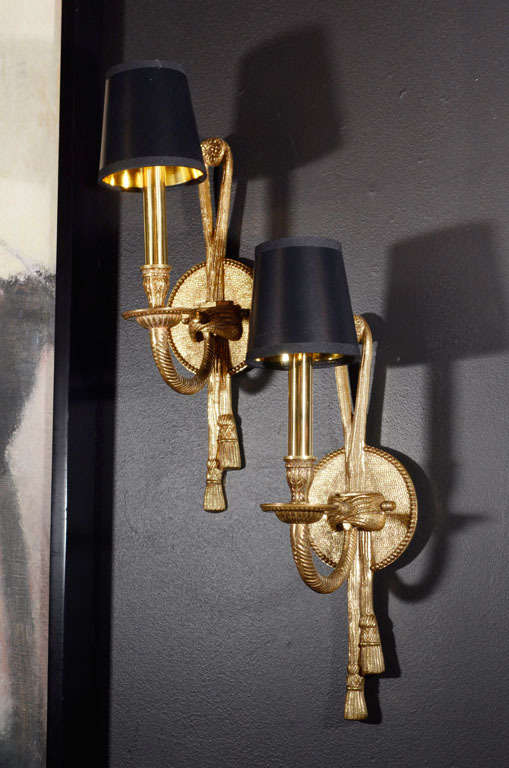 Pair of 1940's Elegant Brass Sconces with Stylized Tassels