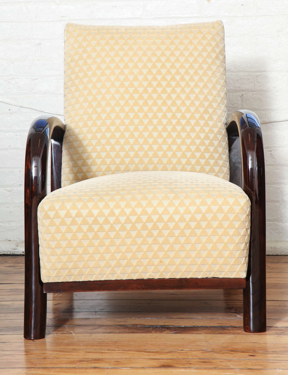 A pair of Art Deco armchairs. Palissandre frame and newly upholstered.