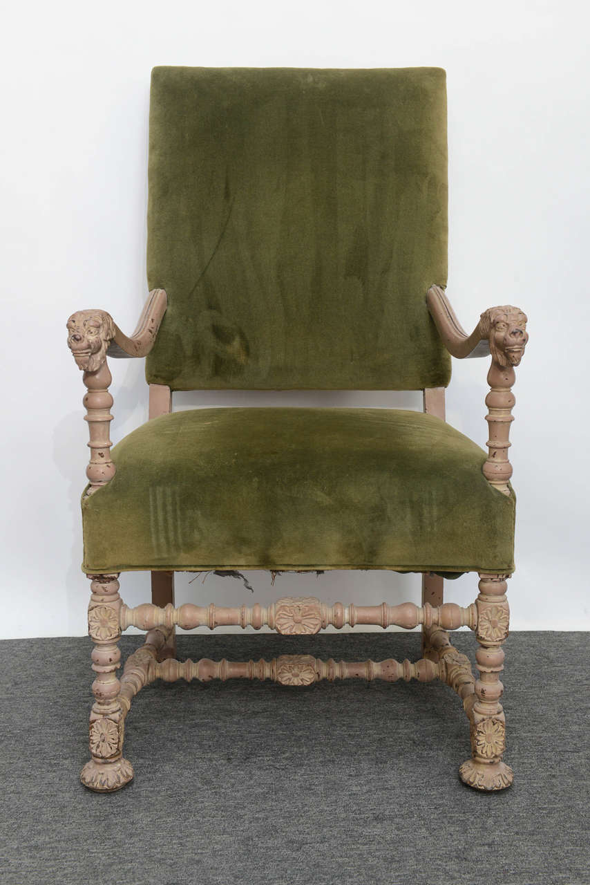 Fantastic French Louis XIII style armchair or Os de Mouton throne chair with stylish carved with a touch of the Sun king, Louis XIV, Baroque. Hand-rests feature a carved lion-head for more regal flair, while the legs and supports all feature more