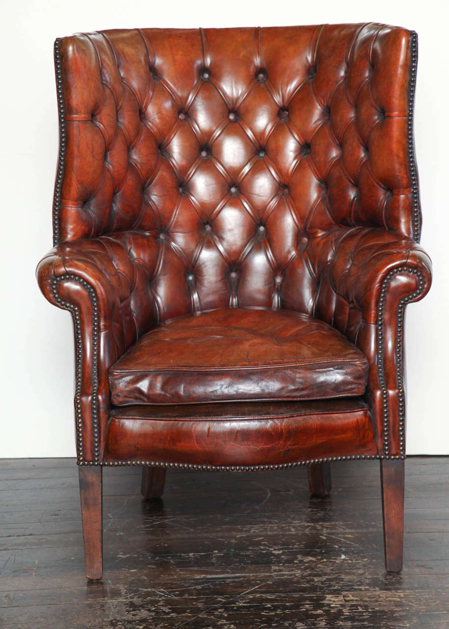 Georgian style leather library chair, circa 1920.