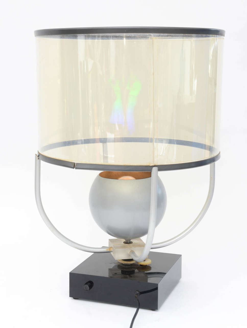 An all original hologram dating back from the 1970s. This piece came from an art, furniture collector that lived in Florida for the last 40 years and was downsizing his collection. This very cool lamp does not photograph that well. In person one can