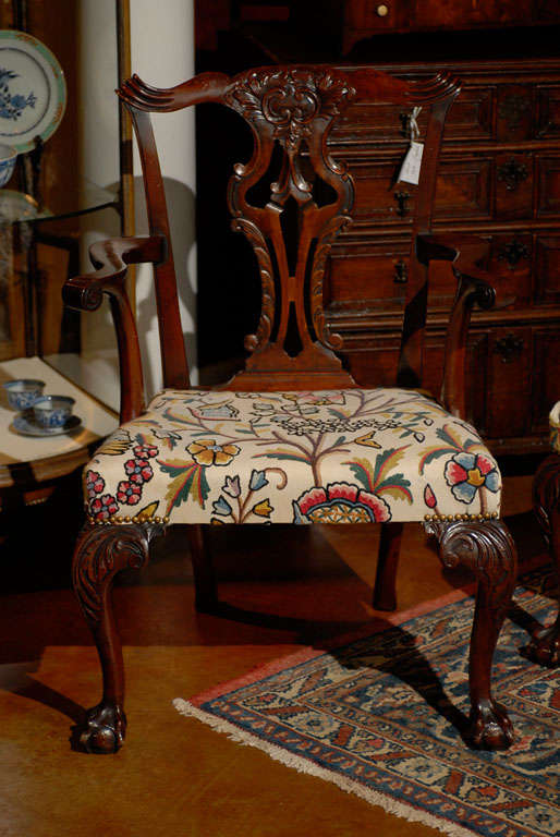 Chairs are beatuifully carved and the upholstery is done in very nice crewelwork, set includes 2 carvers and 8 side chairs.