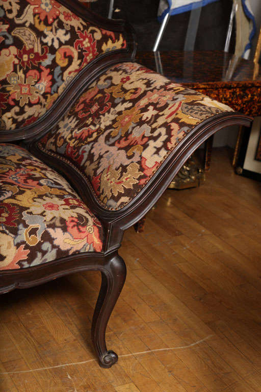 An Italian Walnut Sofa Covered in Needlework with Petit Point 1