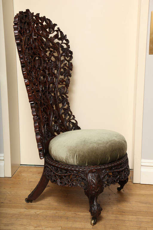 A Hand Carved Rosewood Burmese Slipper Chair at 1stDibs
