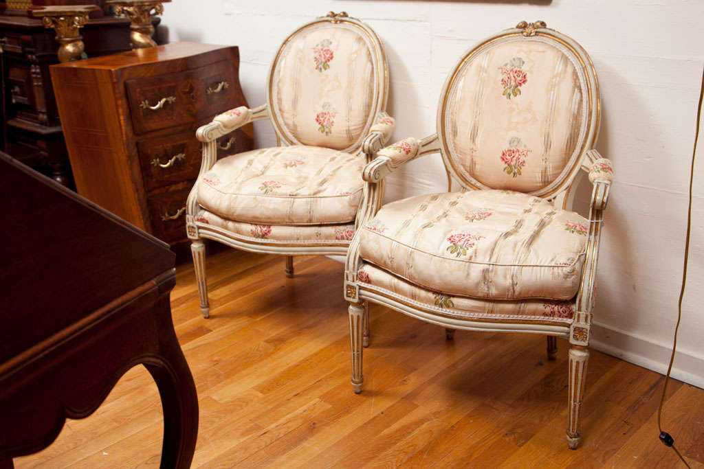 Pair Painted and Parcel Gilt Armchairs