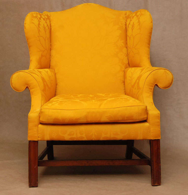 A fine and substantial example of pre-Federal period Philadelphia furniture. The particular outward canted welcoming  rolled arms is a classic Philadelphia trait. The upholstery which is wool damask is in excellent condition and only opened at the