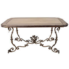 Walnut And Forged Iron Cocktail Table.