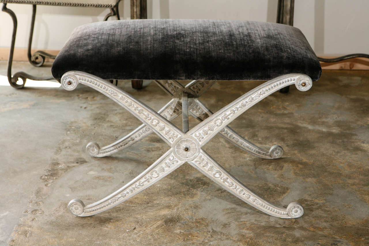 Cast aluminum benches in the Italian Empire manner and with new velvet upholstery.