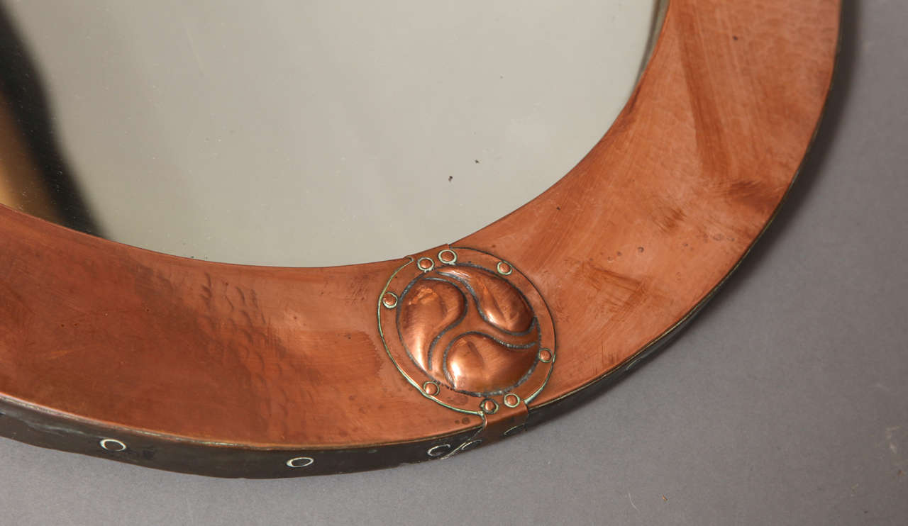 oval copper mirror