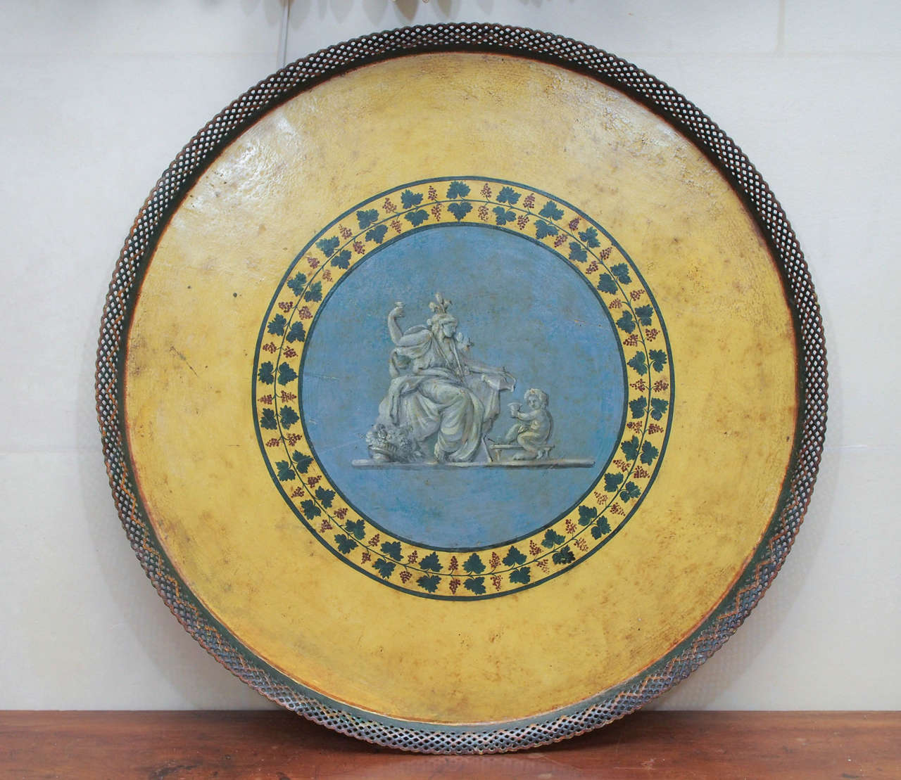 This lovely tole tray is a fine example of late 19th century French tole work, lacquered in blue with a yellow field.