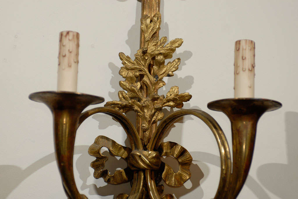 Cast Pair of French Louis XVI Style Bronze Two-Light Sconces with Hunting Horns For Sale