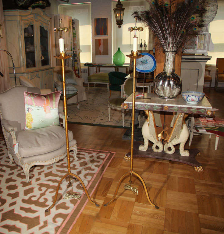 A Pair of Brass Faux Bamboo Floor Lamps