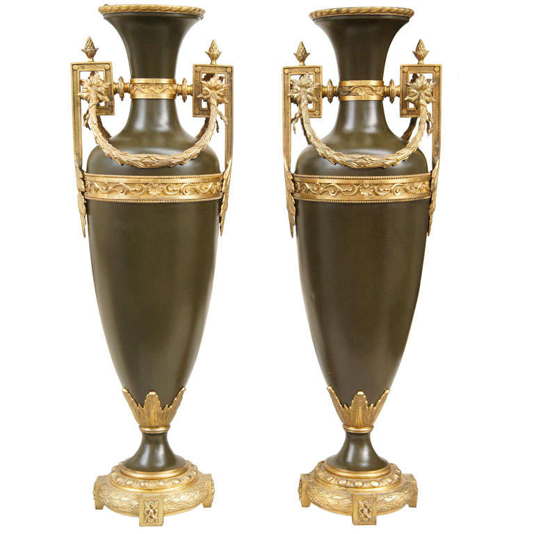 A Large Pair of  Tole and Gilded Bronze Urns