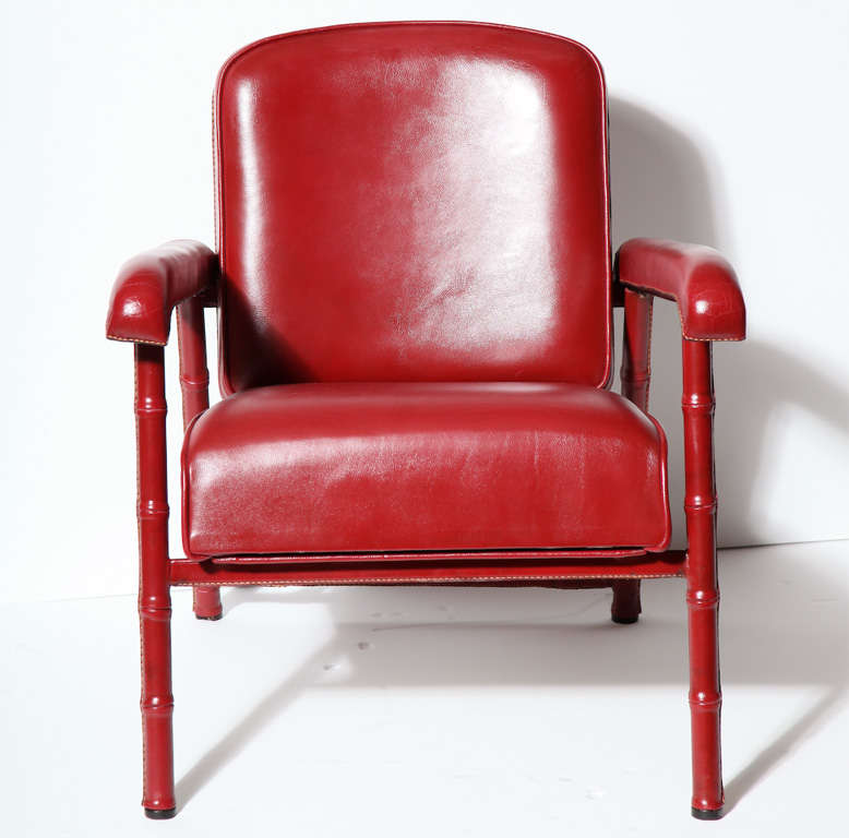 Fine pair of armchairs in saddle-stitched leather by Jacques Adnet (1901-1984)

Seat Height: 14.5 in. – 18 in.
Arm Height:  20.5 in. – 24 in.

Bibliography: Mobilier et Décoration, n ̊ 35, 1955, p. 39, for a similar model.