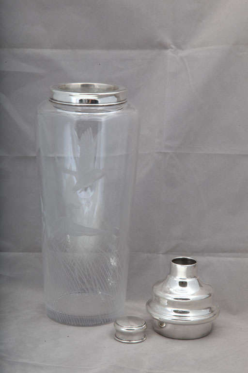 Very large, Art Deco, sterling silver-mounted, wheel-engraved glass cocktail shaker, The Hawkes Company, New York, Ca. 1935; signed by the glass artist, Richard L. Bishop (who worked for Hawkes) and given as a gift to Howard F. Smith. Stands @12