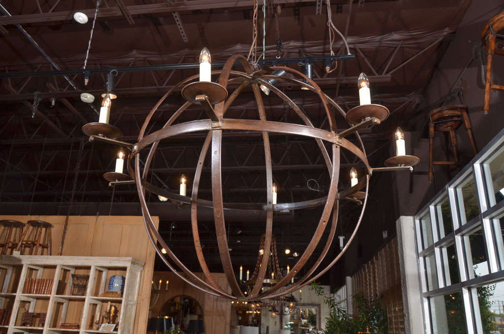 Orb chandelier made from reclaimed antique iron elements.