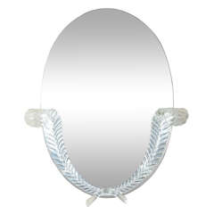 Oval mirror with applied lucite leaf design by Grosfeld House
