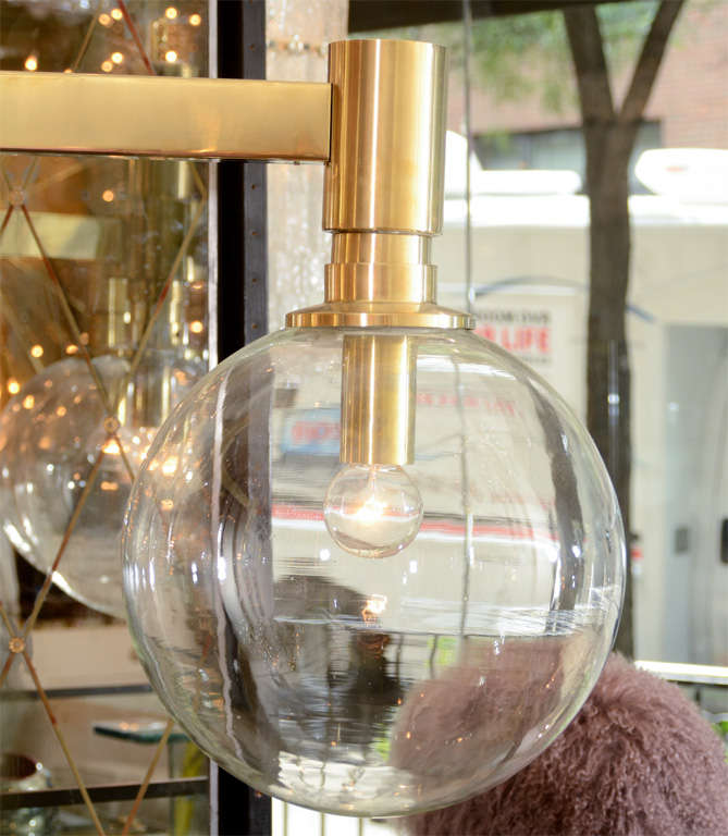 Brass Three-Arm Chandelier with Clear Glass Spherical Shades In Good Condition For Sale In New York, NY