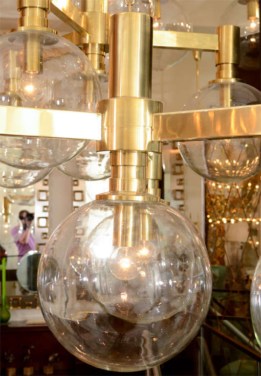 Mid-20th Century Brass Three-Arm Chandelier with Clear Glass Spherical Shades For Sale
