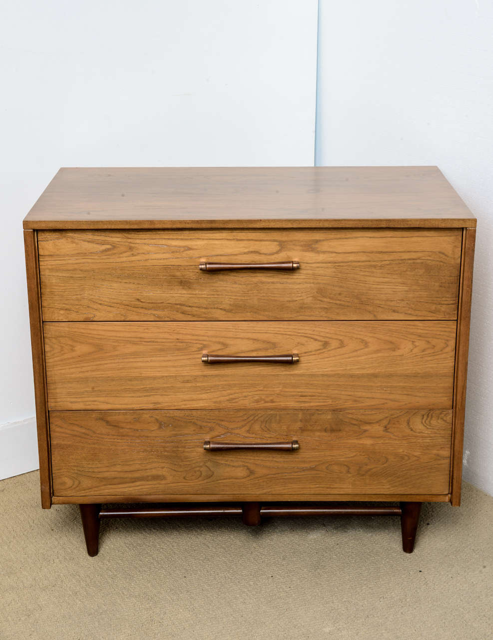 Great pair of commodes dating from the 1950's. These are constructed of solid ashwood . They have been re-furbished back to their original condition. Great pieces to be used as dressers or large nightstands.