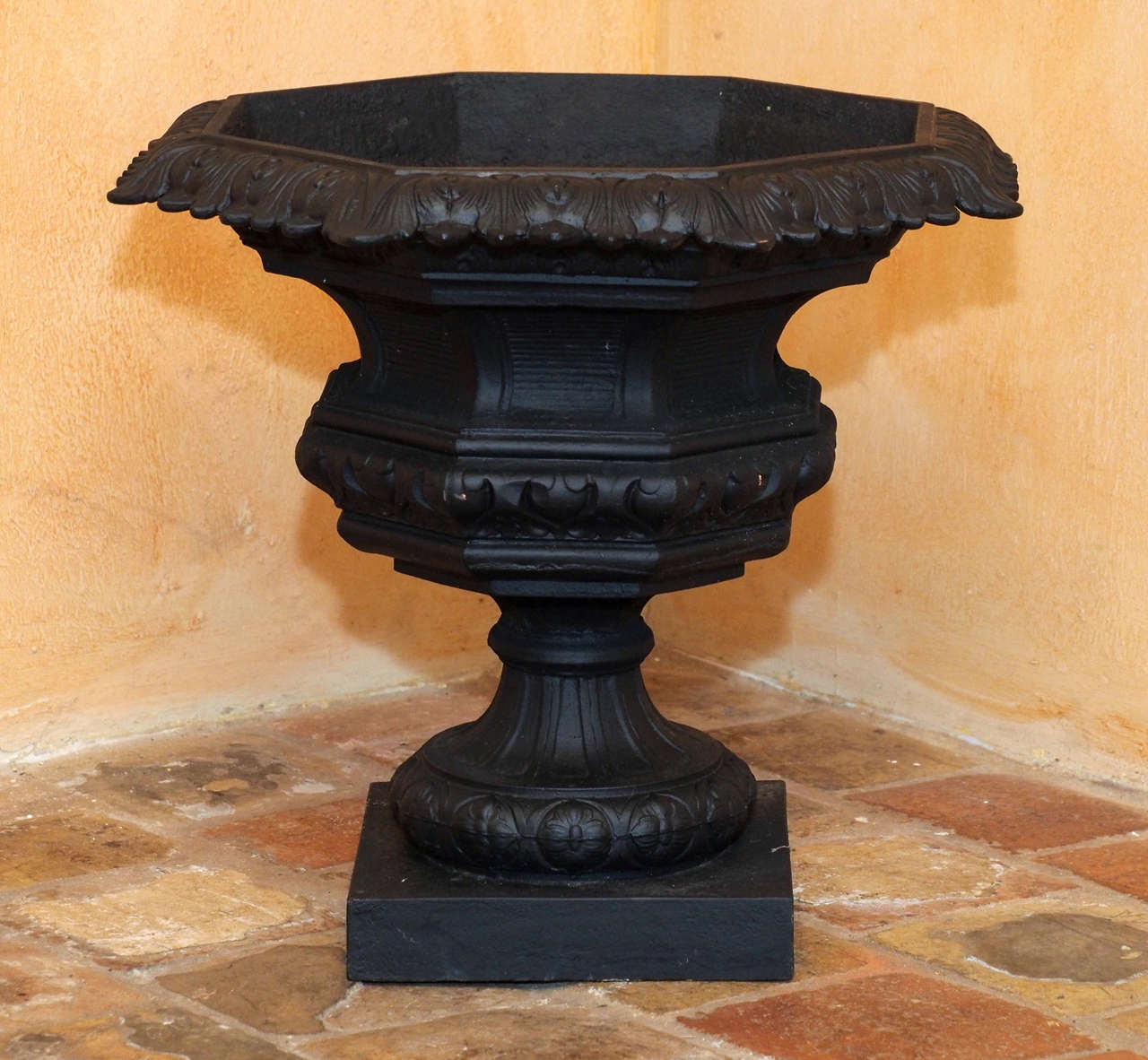 Pair of Late 19th Century Painted French Cast Iron Garden Urns with Octagon Shaped Scalloped Edges on Top.