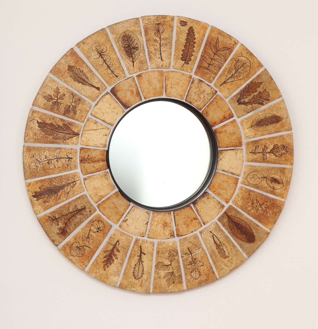 Spectacular tile mirror by French ceramist Roger Capron from his "Garrigue" series. Made in Vallauris in the late 1960s.