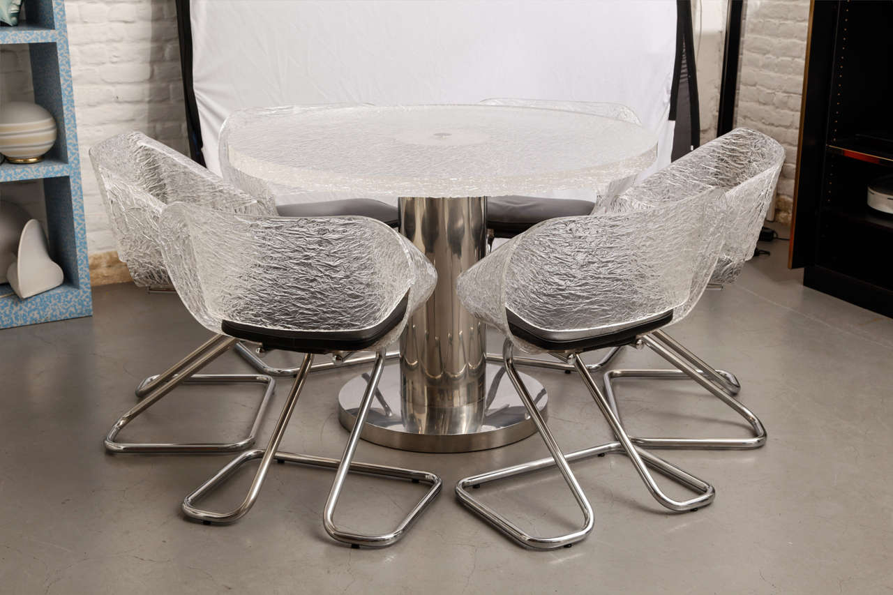 Table and Six Chairs by Guzzini