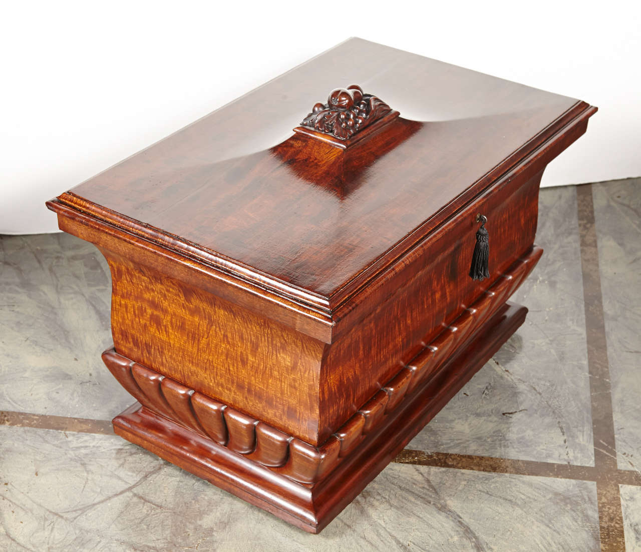19th century Regency wine cooler. Beautiful carved mahogany with a lead liner.