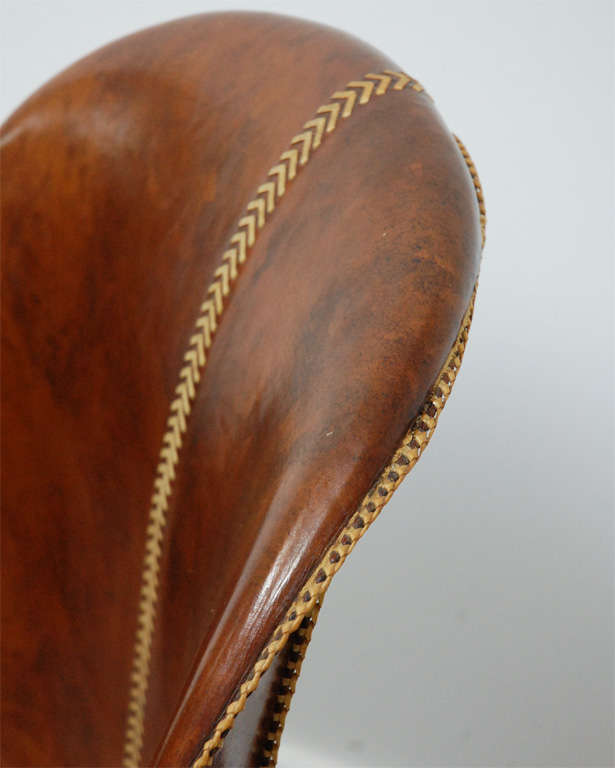 American Important Pair of Leather Clad Chairs with Saddle Stitching by William Haines
