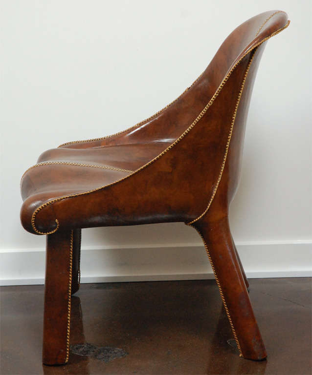Mid-20th Century Important Pair of Leather Clad Chairs with Saddle Stitching by William Haines